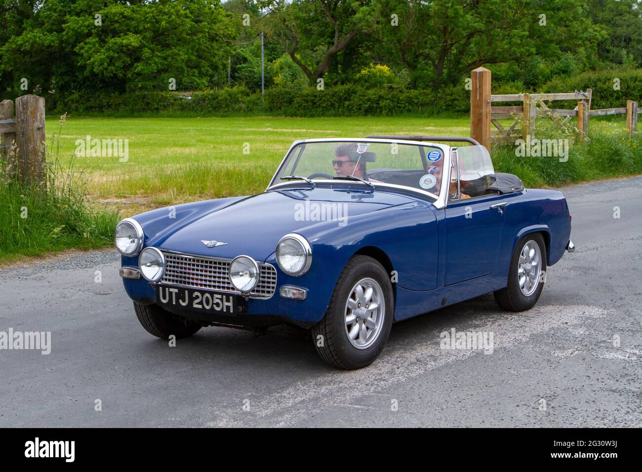1970 blue Austin Healey Sprite at the 58th Annual Manchester to Blackpool Vintage & Classic Car Run The event is a ‘Touring Assembly’ Stock Photo