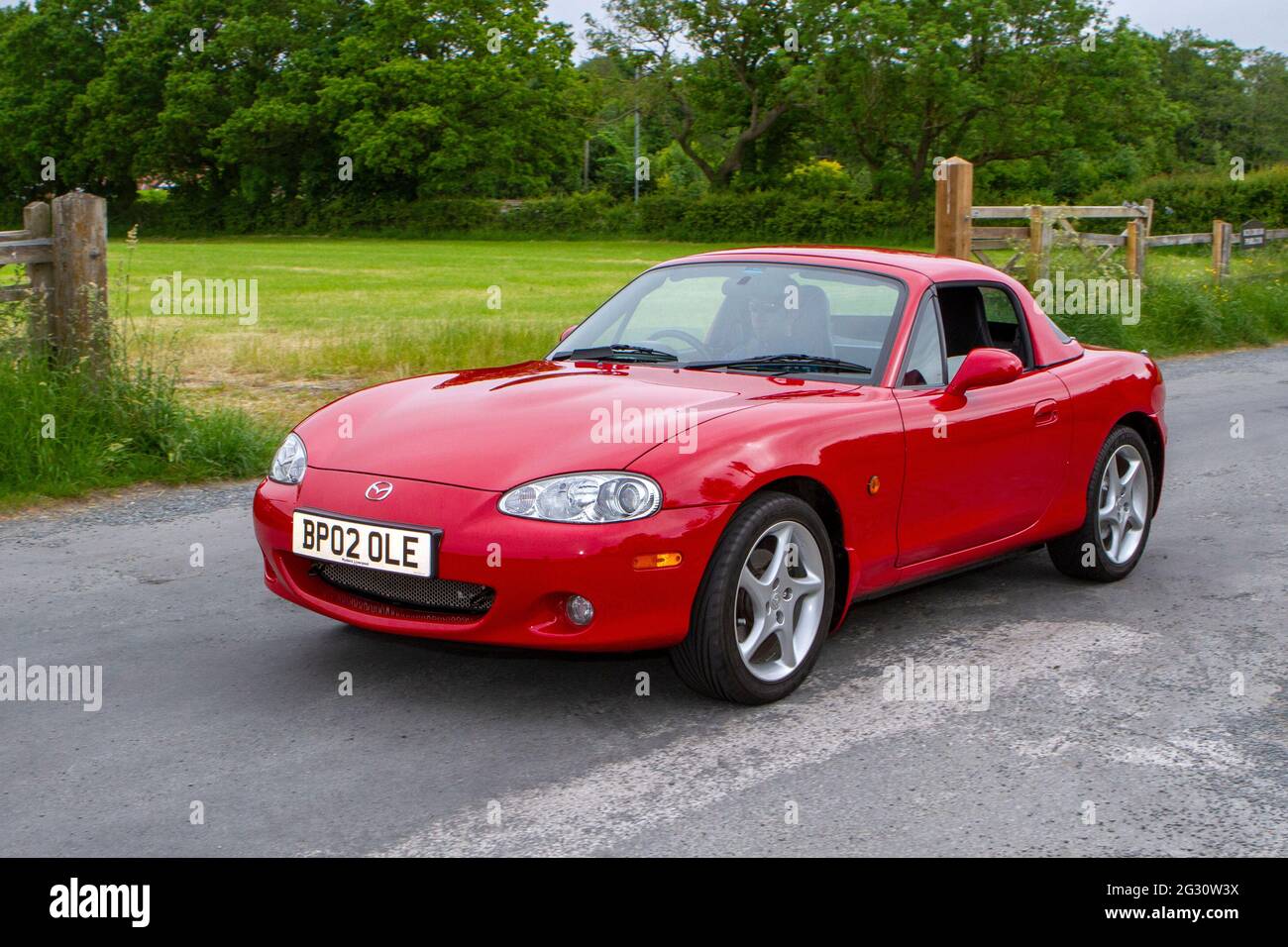 2002 red Mazda Sport 1840cc petrol roadster ar the 58th Annual Manchester to Blackpool Vintage & Classic Car Run The event is a ‘Touring Assembly’ Stock Photo
