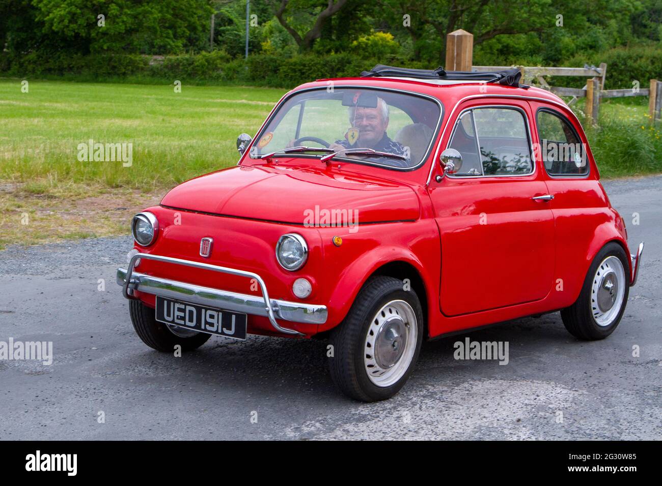 1970 70s red Fiat 499cc at the 58th Annual Manchester to Blackpool Vintage & Classic Car Run The event is a ‘Touring Assembly’ Stock Photo