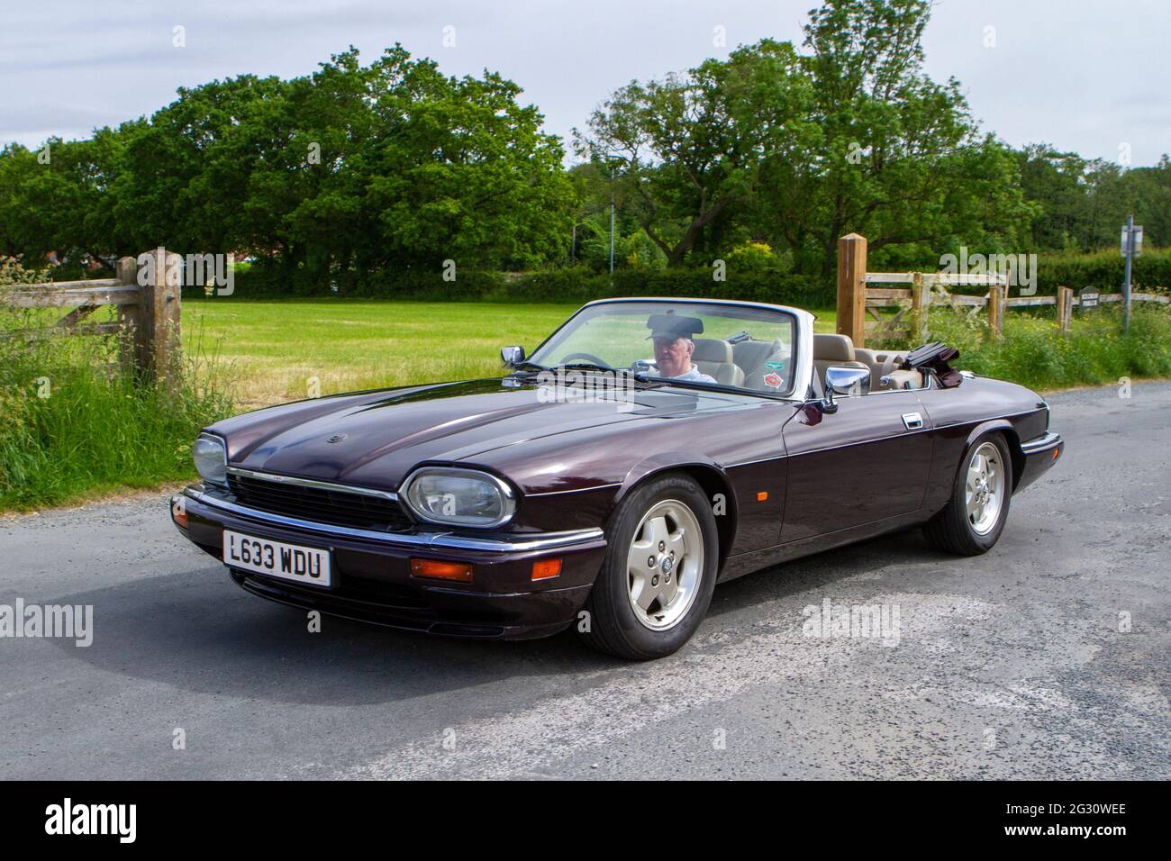 1994 90s red Jaguar XJ-S Sovereign at the 58th Annual Manchester to Blackpool Vintage & Classic Car Run Stock Photo