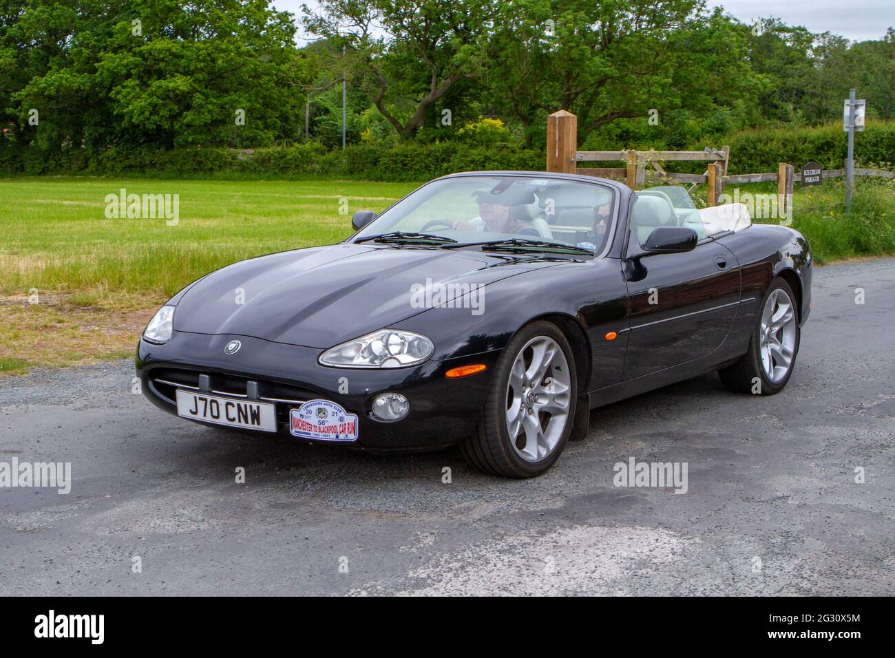 2002 Jaguar XK8 black cabrio, at the 58th Annual Manchester to Blackpool Vintage & Classic Car Run The event is a ‘Touring Assembly' Stock Photo