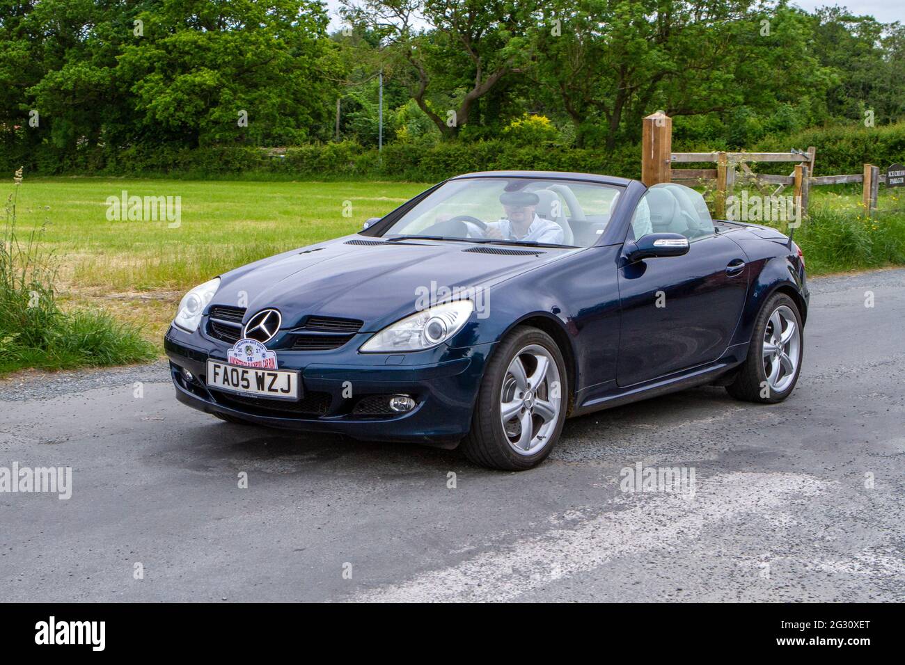 A blue Mercedes SLK convertible 58th Annual Manchester to Blackpool Vintage & Classic Car Run The event is a ‘Touring Assembly’ Stock Photo