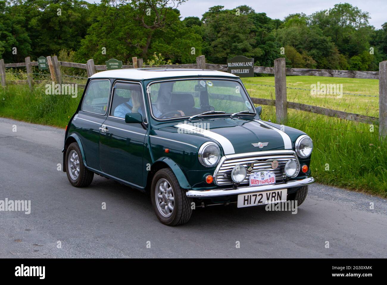 1990 90s green striped Rover Cooper 1 at the 58th Annual Manchester to Blackpool Vintage & Classic Car Run The event is a ‘Touring Assembly’ Stock Photo