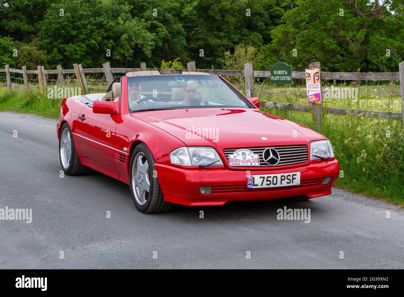 1993 90s red Mercedes 500 4973cc petrol at the 58th Annual Manchester to Blackpool Vintage & Classic Car Run The event is a ‘Touring Assembly’ Stock Photo