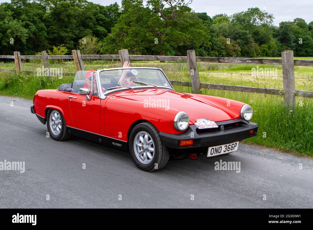 1976 red 70s MG Midget 1500 at the 58th Annual Manchester to Blackpool Vintage & Classic Car Run The event is a ‘Touring Assembly’ Stock Photo