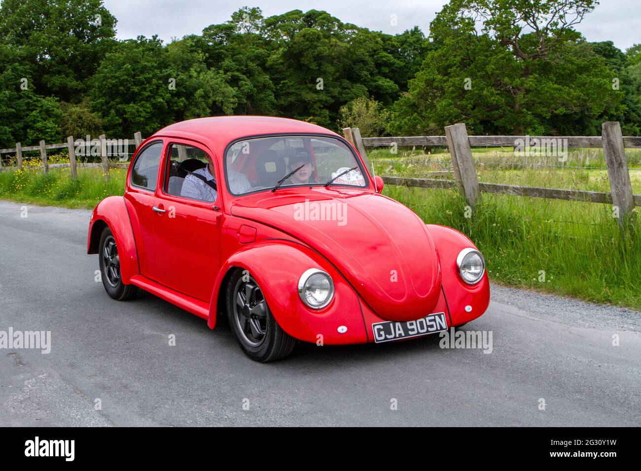 1975 70s red VW Volkswagen 1200 Beetle at the 58th Annual Manchester to Blackpool Vintage & Classic Car Run The heritage event is a ‘Touring Assembly’ Stock Photo