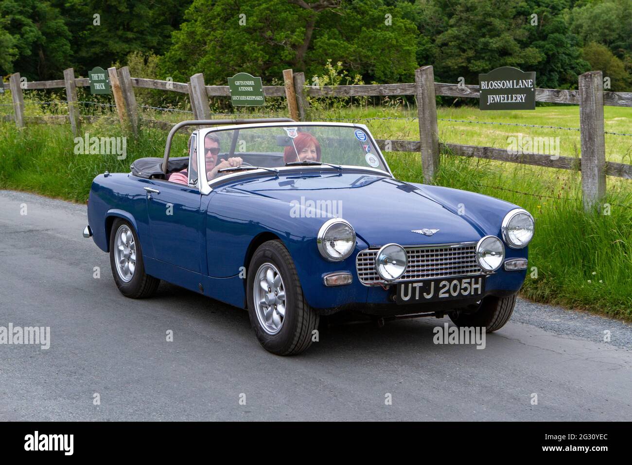 1970 70s blue Austin Healey Sprite 1275cc petrol at the 58th Annual Manchester to Blackpool Vintage & Classic Car Run event a ‘Touring Assembly’ Stock Photo