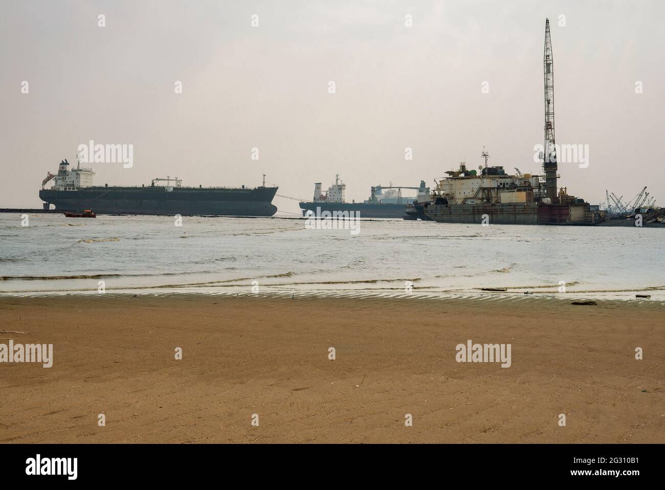 Alang,01,February, 2016 Panoramic view of seaside with different types of large ships anchored at Alang Ship Breaking Yard for scrapping , Bhavnagar Stock Photo