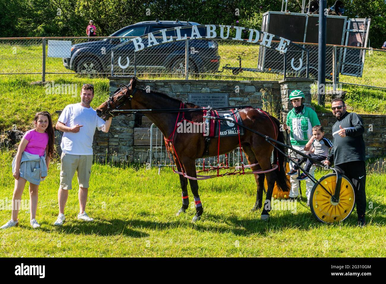 Dunmanway, West Cork, Ireland. 13th June, 2021. There was an 8 race card of sulky racing at Ballabuidhe Race Track, Dunmanway today, with spectators taking full advantage of the sunshine on the hottest day of the year so far. The winner of the 6th race was 'Llwyns Delight' owned and trained by John Manning, pictured with his son Ryan, driving, his children Abi and Callum and co-trainer Michael Shanahan. Credit: AG News/Alamy Live News Stock Photo