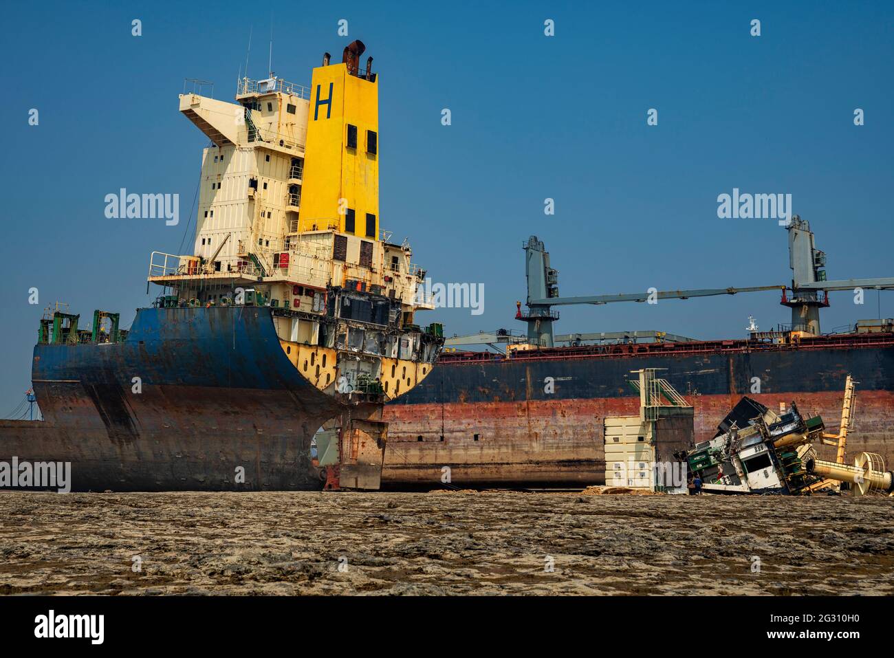 Alang ,01,February, 2016:,Close up view of half cut ship with parts lying at Ship Breaking Yard , Bhavnagar, Gujarat, India, Stock Photo