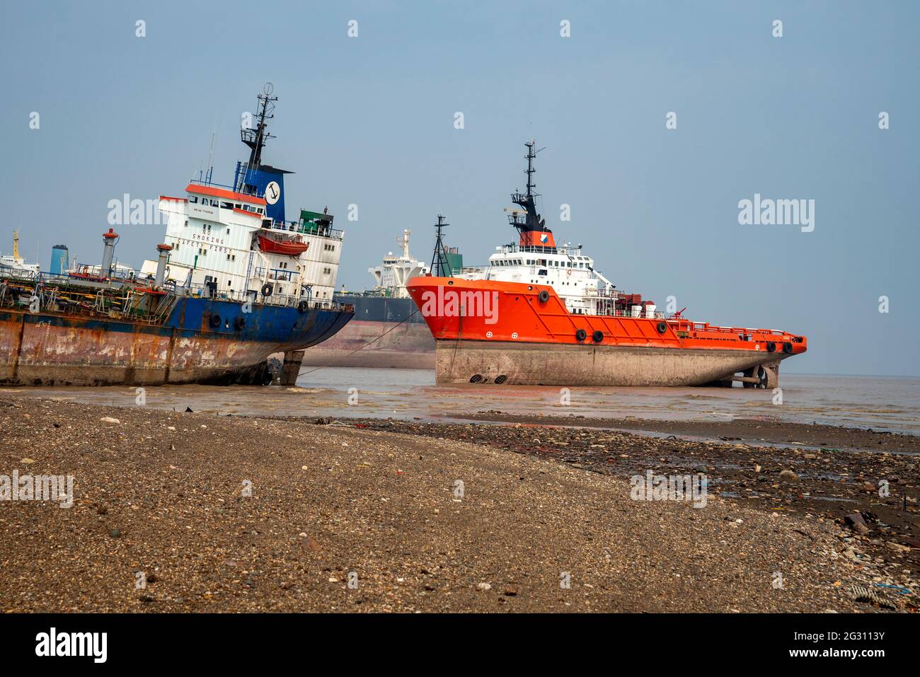 Alang ,01, February,2016: Close up view of different types of boats  anchored at Alang Ship Breaking Yard for scrapping,Bhavnagar, Gujarat,India Stock Photo