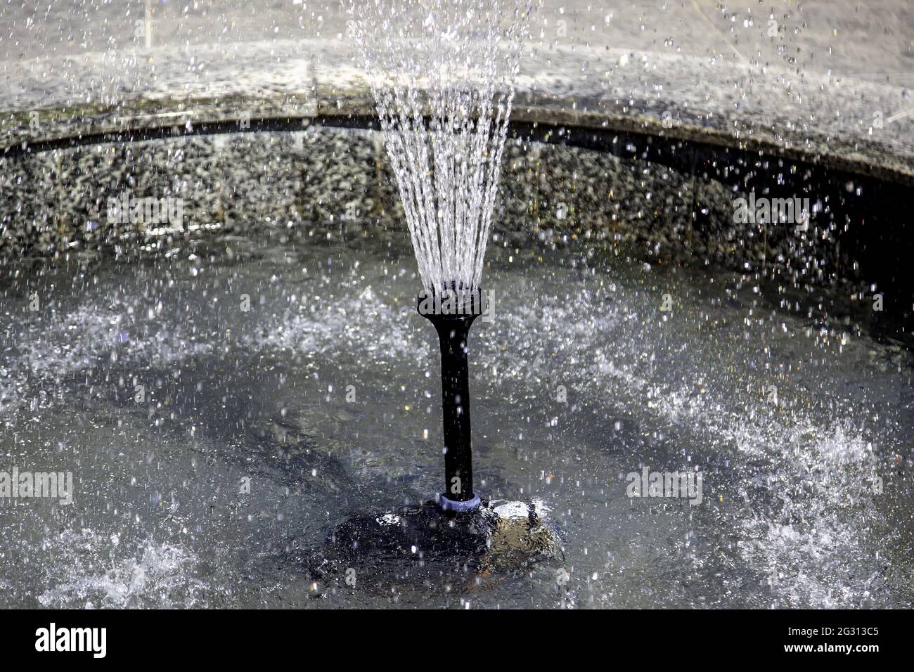 Pressure water fountain with jet and drops, nature Stock Photo - Alamy