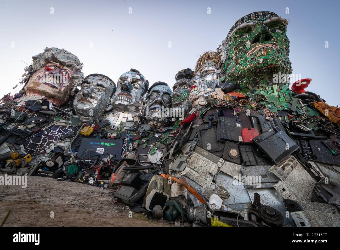 St Ives, UK. 13th June, 2021. A statue made out of electrical waste representing the G7 leaders is built on sandy Acres. Extinction Rebellion take action for the third and final day of the G7 Summit. Credit: Andy Barton/Alamy Live News Stock Photo
