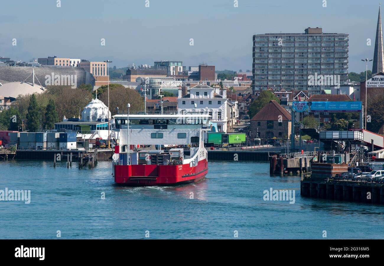Southampton, England, UK. 2021. A single deck vehicle carrier ship with trucks on board approaching the terminal Stock Photo