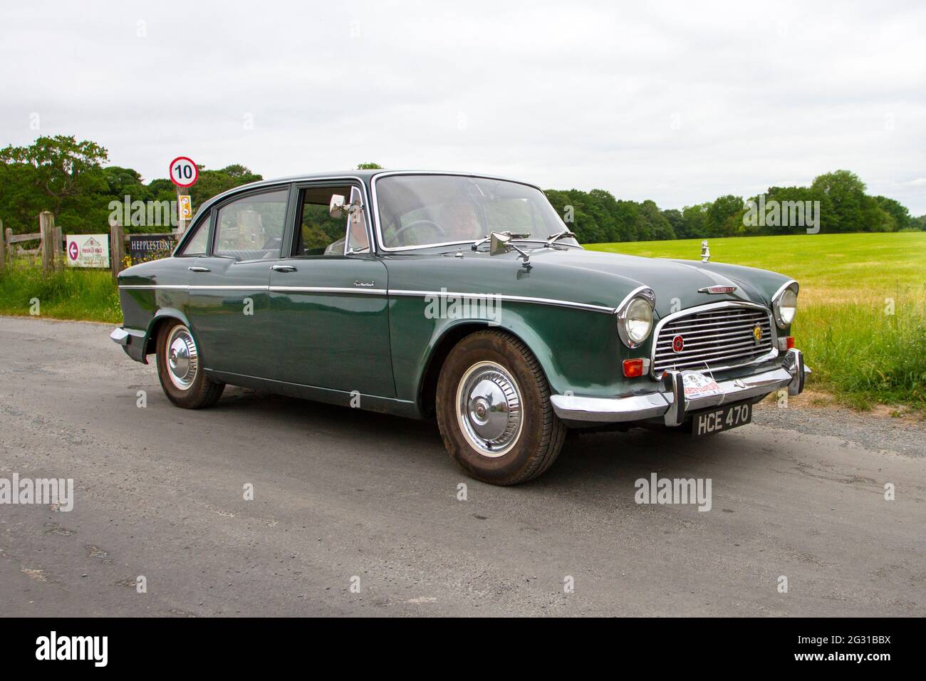 1967 60s Humber Hawk green 2267cc petrol 4dr saloon travelling to classic and vintage car show at Heskin Hall, Lancashire, UK Stock Photo