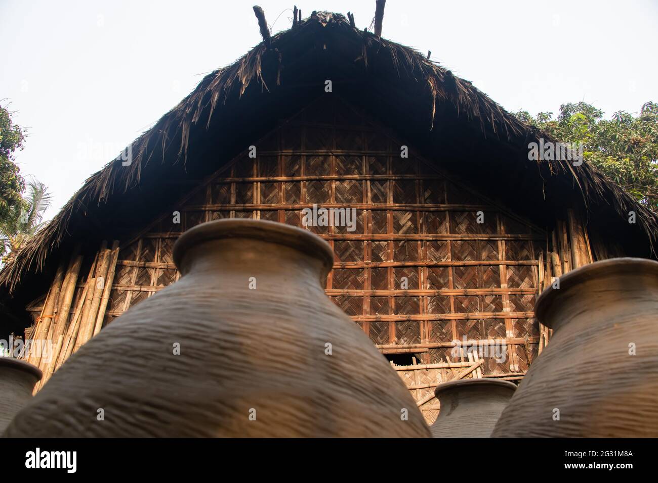 A straw house and pottery. This image captured on March 30, 2021, from Shekhornagar, Bangladesh, South Asia Stock Photo