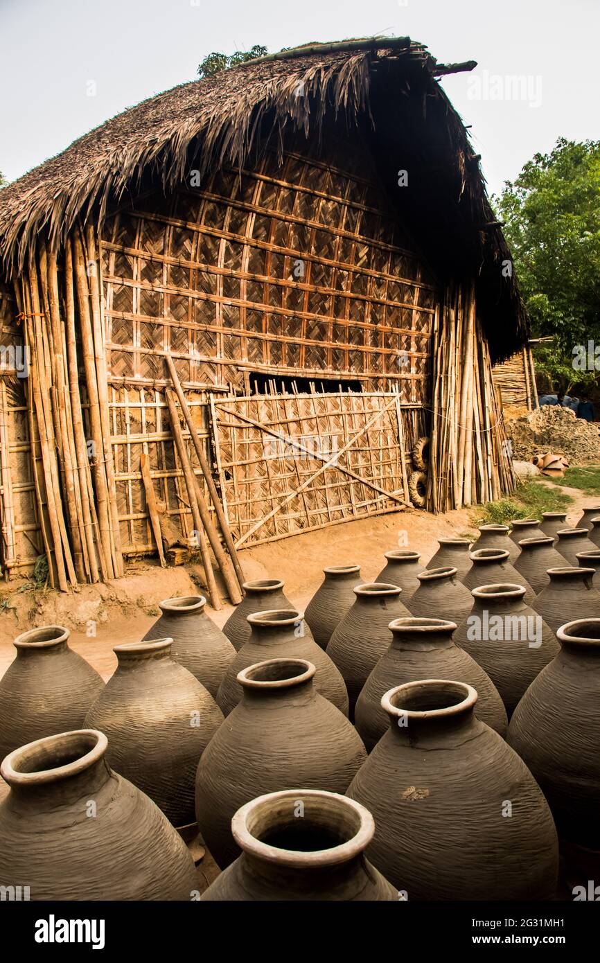 A straw house and pottery. This image captured on March 30, 2021, from Shekhornagar, Bangladesh, South Asia Stock Photo