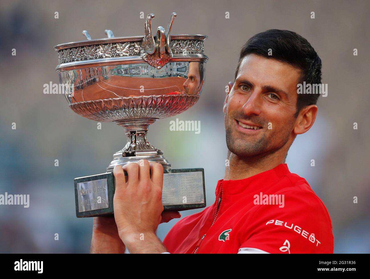 Tennis - French Open - Roland Garros, Paris, France - June 13, 2021  Serbia's Novak Djokovic celebrates with the trophy after winning the French  Open against Greece's Stefanos Tsitsipas REUTERS/Gonzalo Fuentes Stock  Photo - Alamy