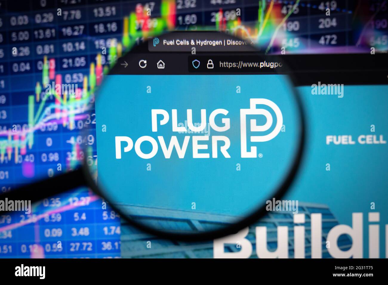 Plug Power company logo on a website with blurry stock market developments  in the background, seen on a computer screen through a magnifying glass  Stock Photo - Alamy