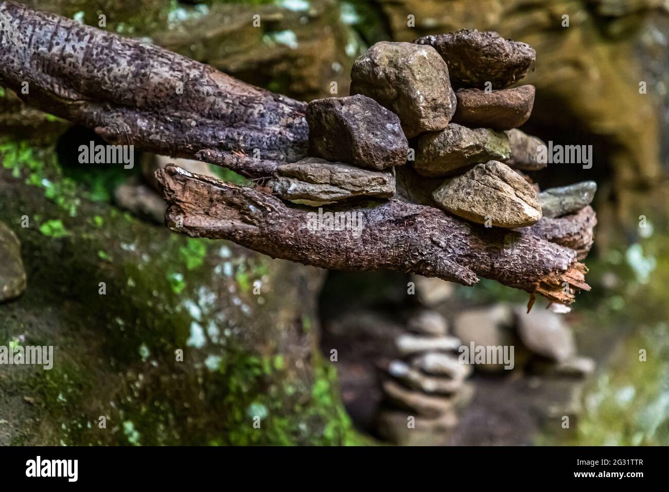Cairns on the hiking trail through the Mullerthal valley near Berdorf, Luxembourg Stock Photo