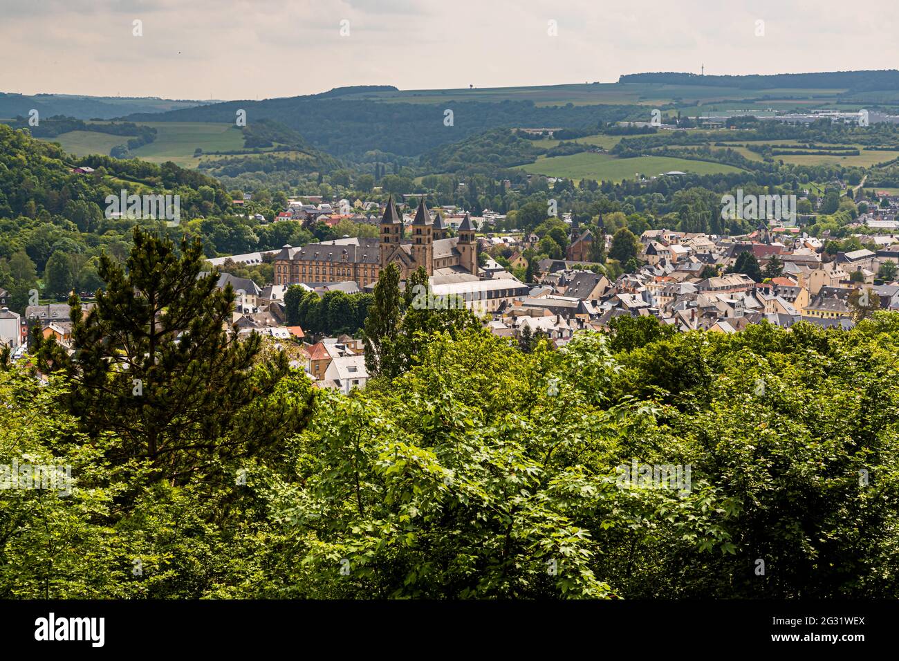 Echternach with the basilica seen from the viewpoint Trooskneppchen. Panorama shot Cityscape of Echternach, Luxembourg Stock Photo