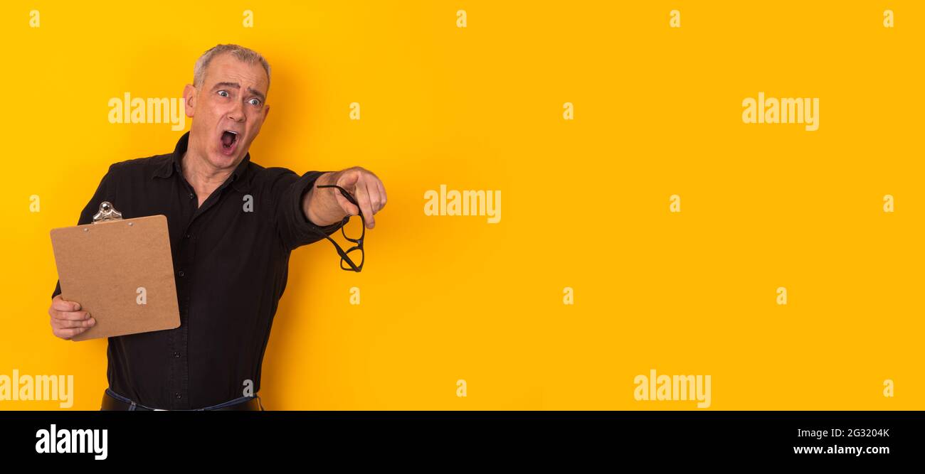 isolated businessman yelling and pointing Stock Photo