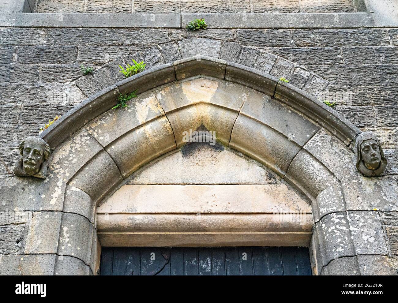Carved stone heads hi-res stock photography and images - Alamy