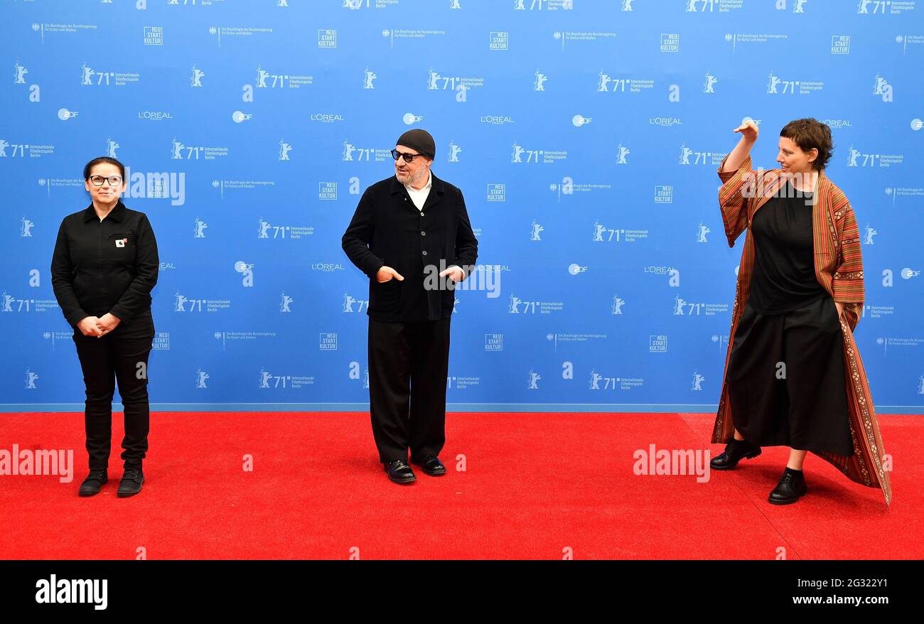 Berlin, Germany. 13th June, 2021. Members of the International Jury of the 71st Berlin International Film Festival, Hungarian director Ildiko Enyedi (l-r), Italian director Gianfranco Rosi and Romanian director Adina Pintilie, show off before the award ceremony at the Berlinale Summer Festival. Credit: Tobias Schwarz/AFP-Pool/dpa/Alamy Live News Stock Photo