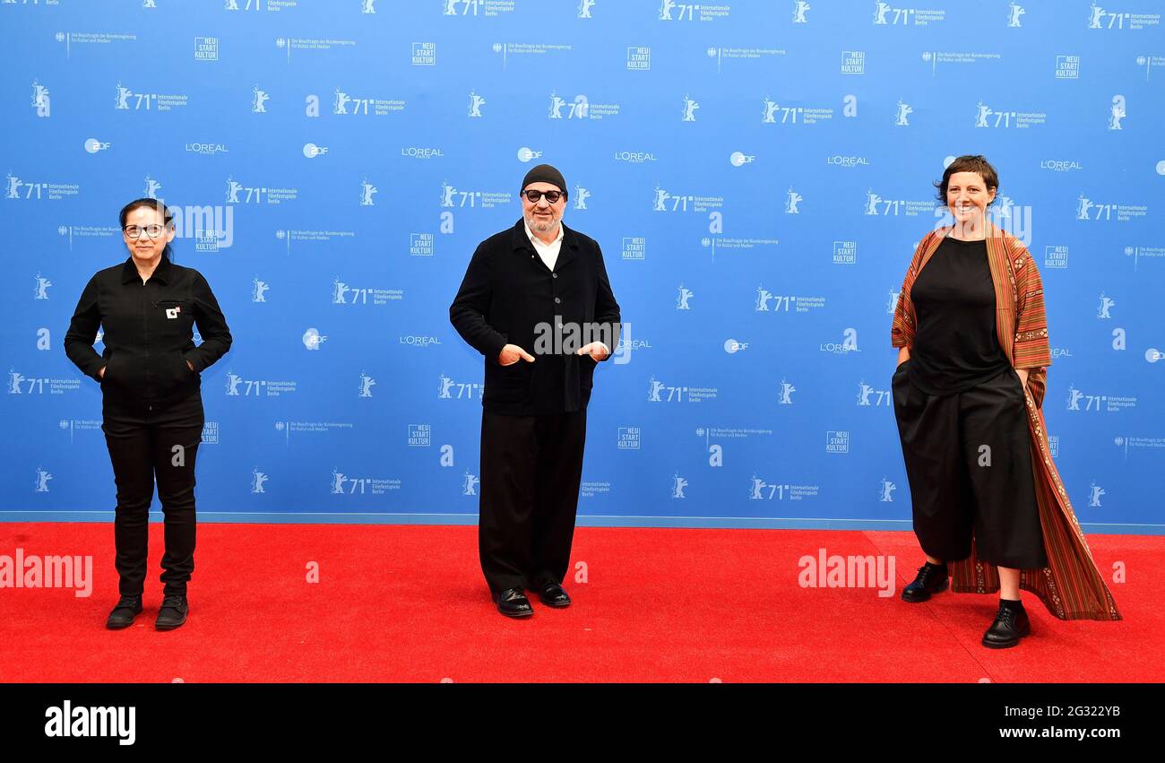 Berlin, Germany. 13th June, 2021. Members of the International Jury of the 71st Berlin International Film Festival, Hungarian director Ildiko Enyedi (l-r), Italian director Gianfranco Rosi and Romanian director Adina Pintilie, show off before the award ceremony at the Berlinale Summer Festival. Credit: Tobias Schwarz/AFP-Pool/dpa/Alamy Live News Stock Photo