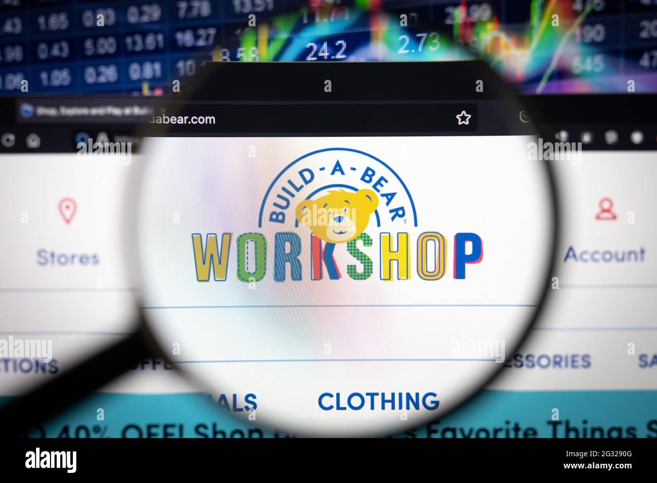 Build a Bear Workshop company logo on a website with blurry stock market developments in the background, seen on a computer screen Stock Photo