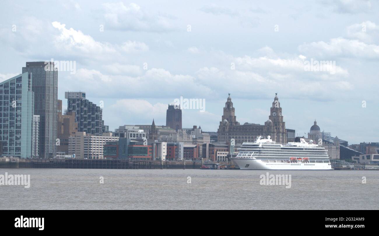 historic Liverpool water front with a Viking Cruise ship boarding its passengers Stock Photo