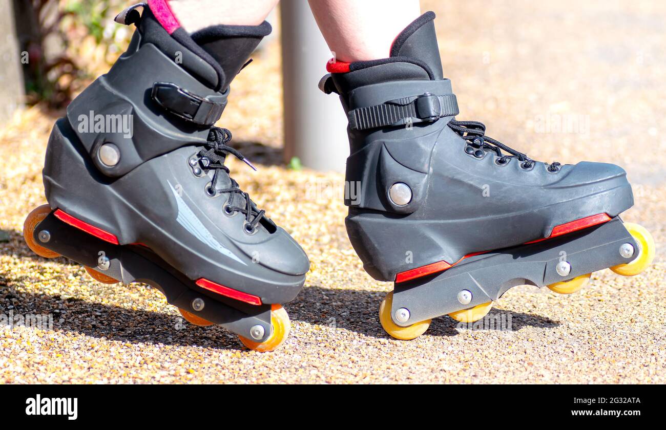 Black roller blades skates hi-res stock photography and images - Alamy
