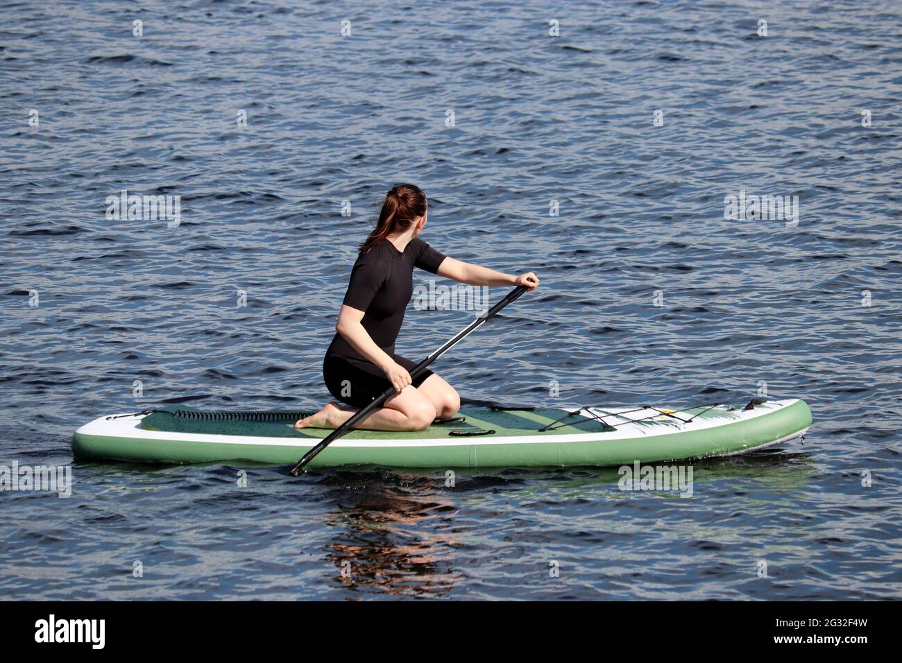 Kneeling girl water hi-res stock photography and images - Alamy