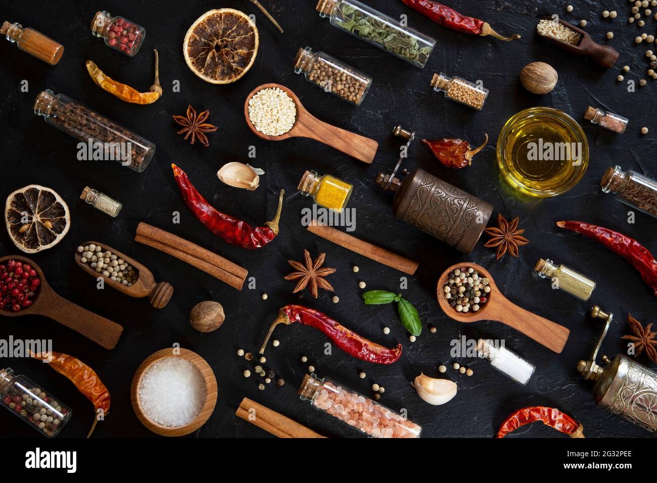 Various spices on black background Stock Photo