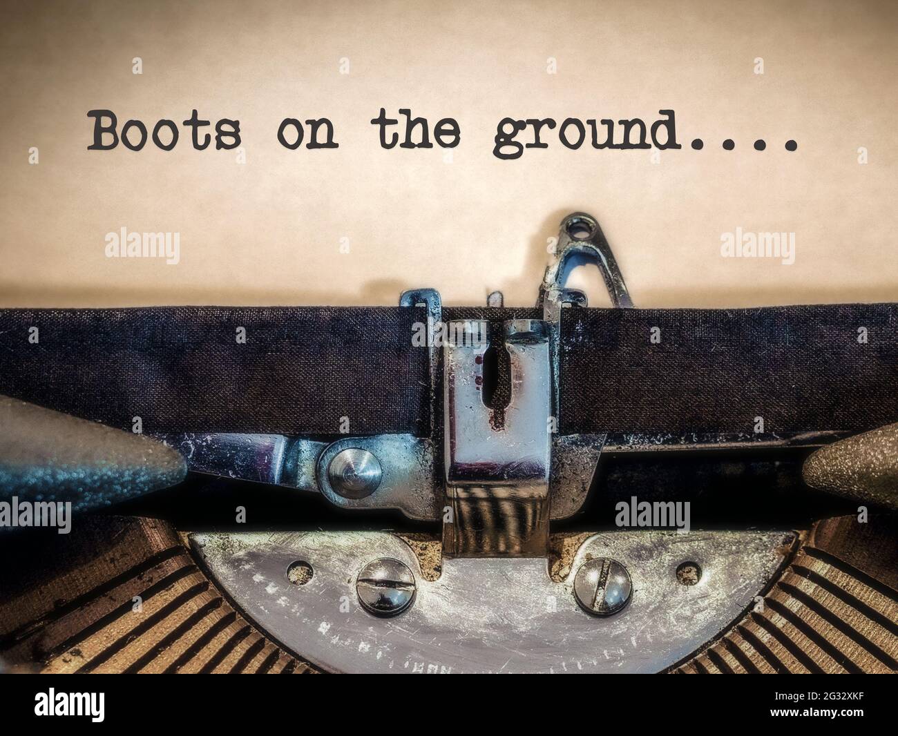 Boots on the ground phrase displayed on a vintage typewriter Stock Photo Alamy