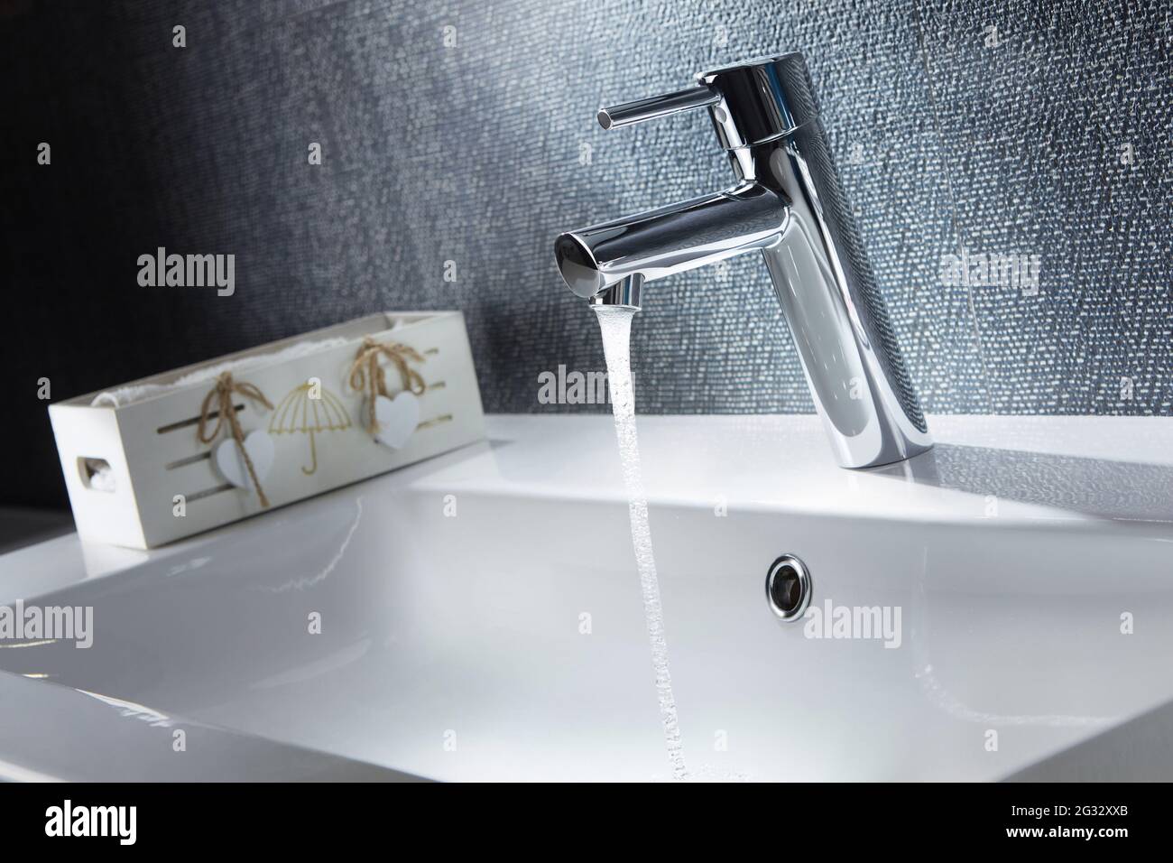 Bathroom water mixer. Water tap made of chrome material Stock Photo Alamy