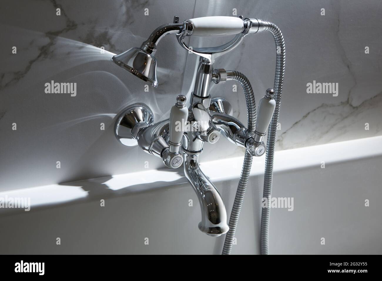 Bathroom water mixer. Water tap made of chrome material Stock Photo Alamy