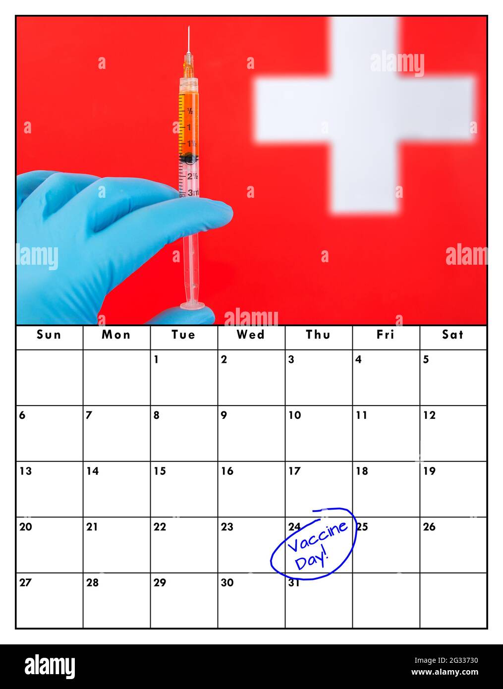 A calendar with Vaccine Day written and circled in blue pen. Above is a picture of a hand rearing a blue glove preparing to give a vaccination. Stock Photo