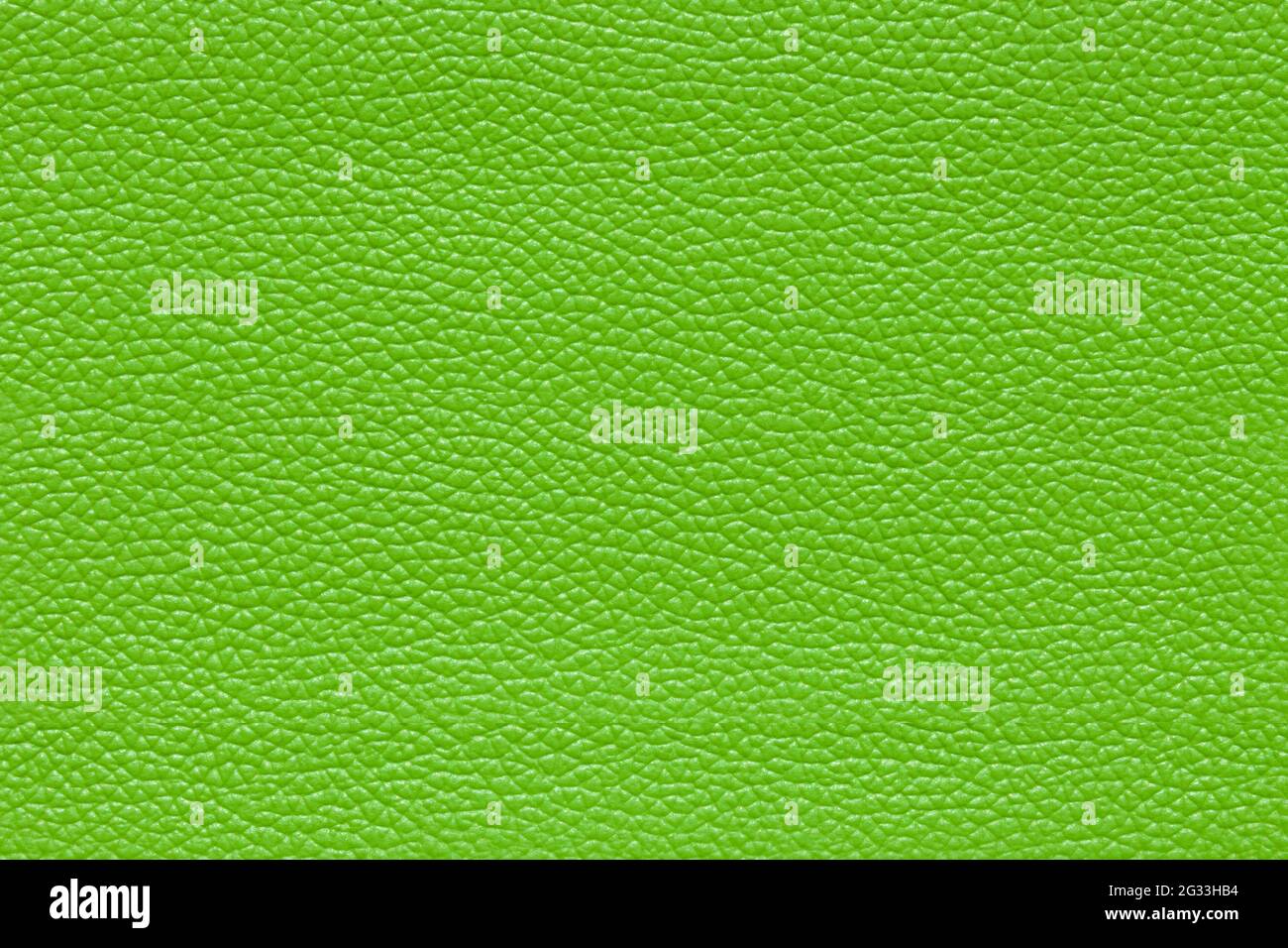 Background image - green leather with textured abstract pattern. Stock Photo