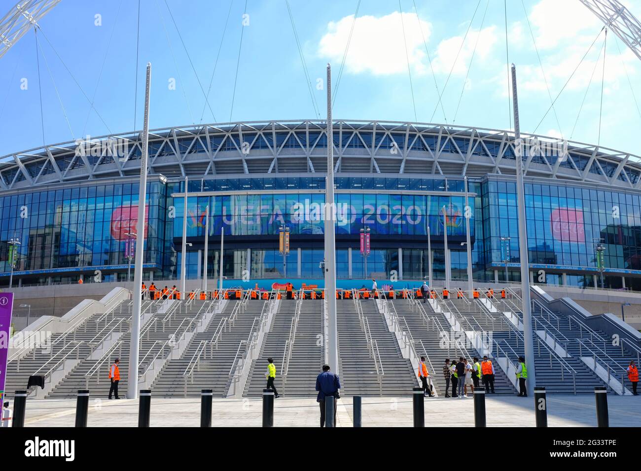 London, UK. The exterior of Wembley stadium on a sunny day. 'Euro 2020' is displayed on the board as venue hosts eight matches during the tournament. Stock Photo