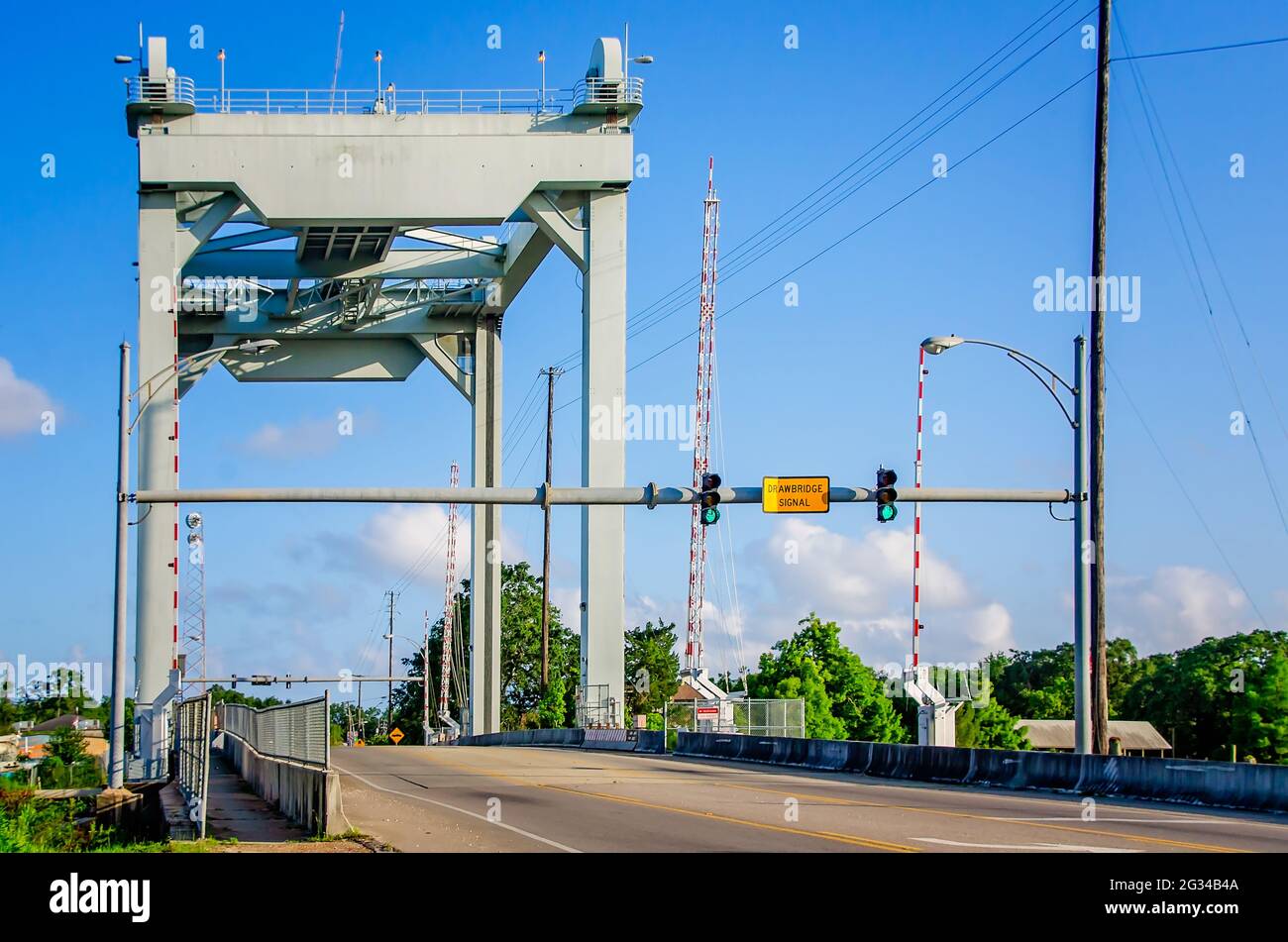 The J.A. Wintzell Memorial Bridge is pictured, June 9, 2021, in Bayou La Batre, Alabama. The vertical lift bridge was built in 1984. Stock Photo