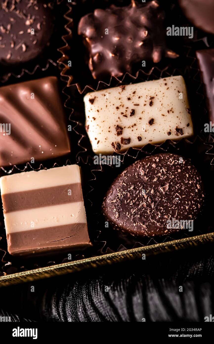 Swiss chocolates in gift box, various luxury pralines made of dark and milk  organic chocolate in chocolaterie in Switzerland, sweet dessert food as  Stock Photo - Alamy