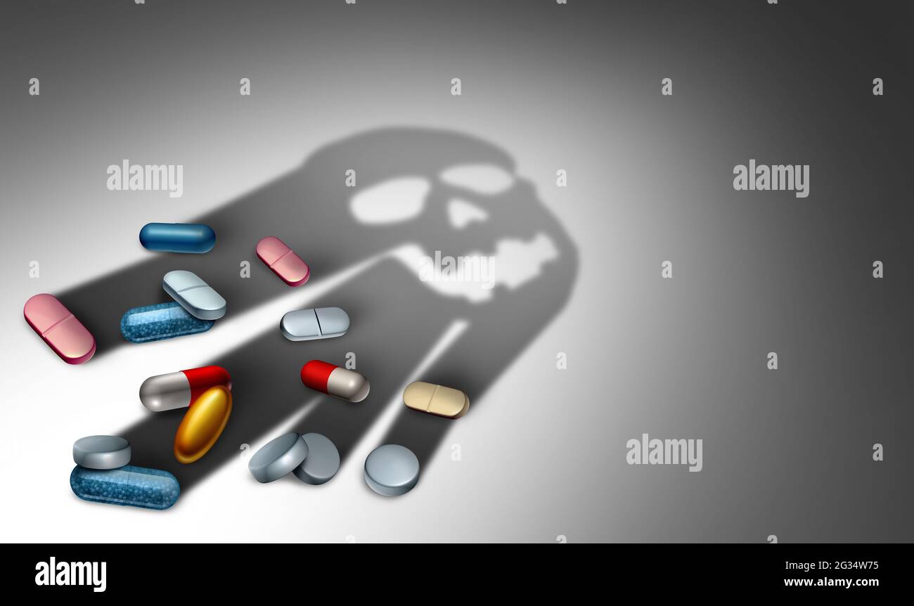 Dangers of medicine and prescription pain medication danger or the health risk opioid painkiller and prescribed pills concept as the shadow. Stock Photo