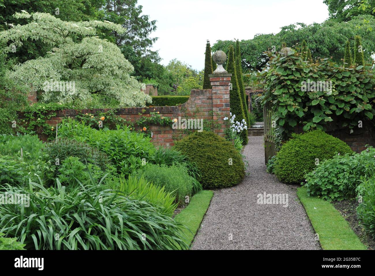 WOLLERTON, SHROPSHIRE / UNITED KINGDOM - 22 MAY 2014: The garden at Wollerton Old Hall Stock Photo