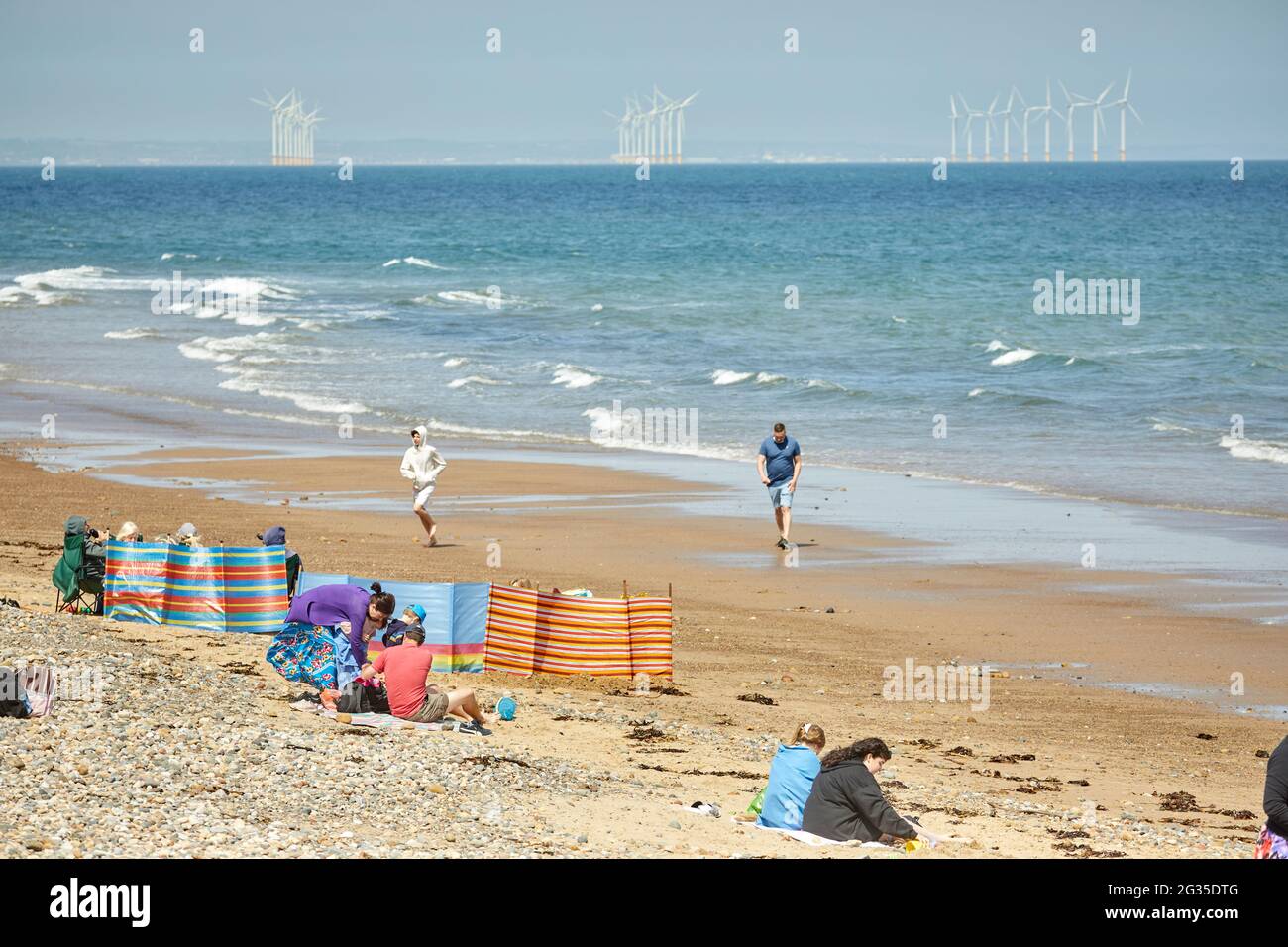 Saltburn-by-the-Sea, seaside town in Redcar and Cleveland, North Yorkshire, England. Windfarms off the coast Stock Photo