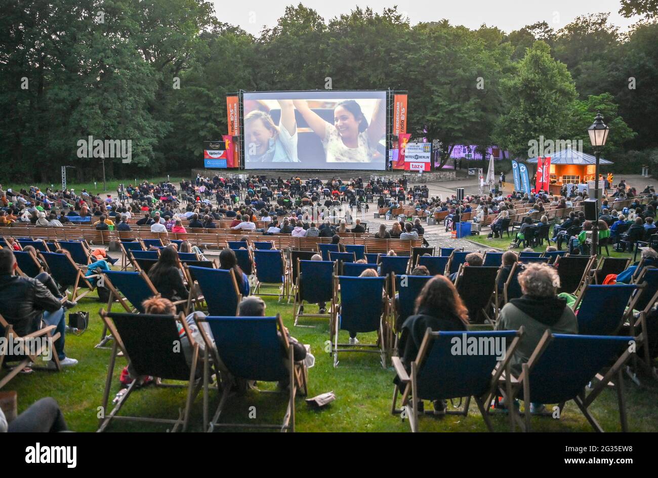 Berlin, Germany. 13th June, 2021. Numerous audience members sit during a late-night screening at the Friedrichshain open-air cinema during the premiere of 'The World Will Be a Different Place' of the Panorama section at the 71st International Film Festival. Following a digital format in March, the Berlinale opens its summer festival to the public. Credit: Jens Kalaene/dpa-Zentralbidl/dpa/Alamy Live News Stock Photo