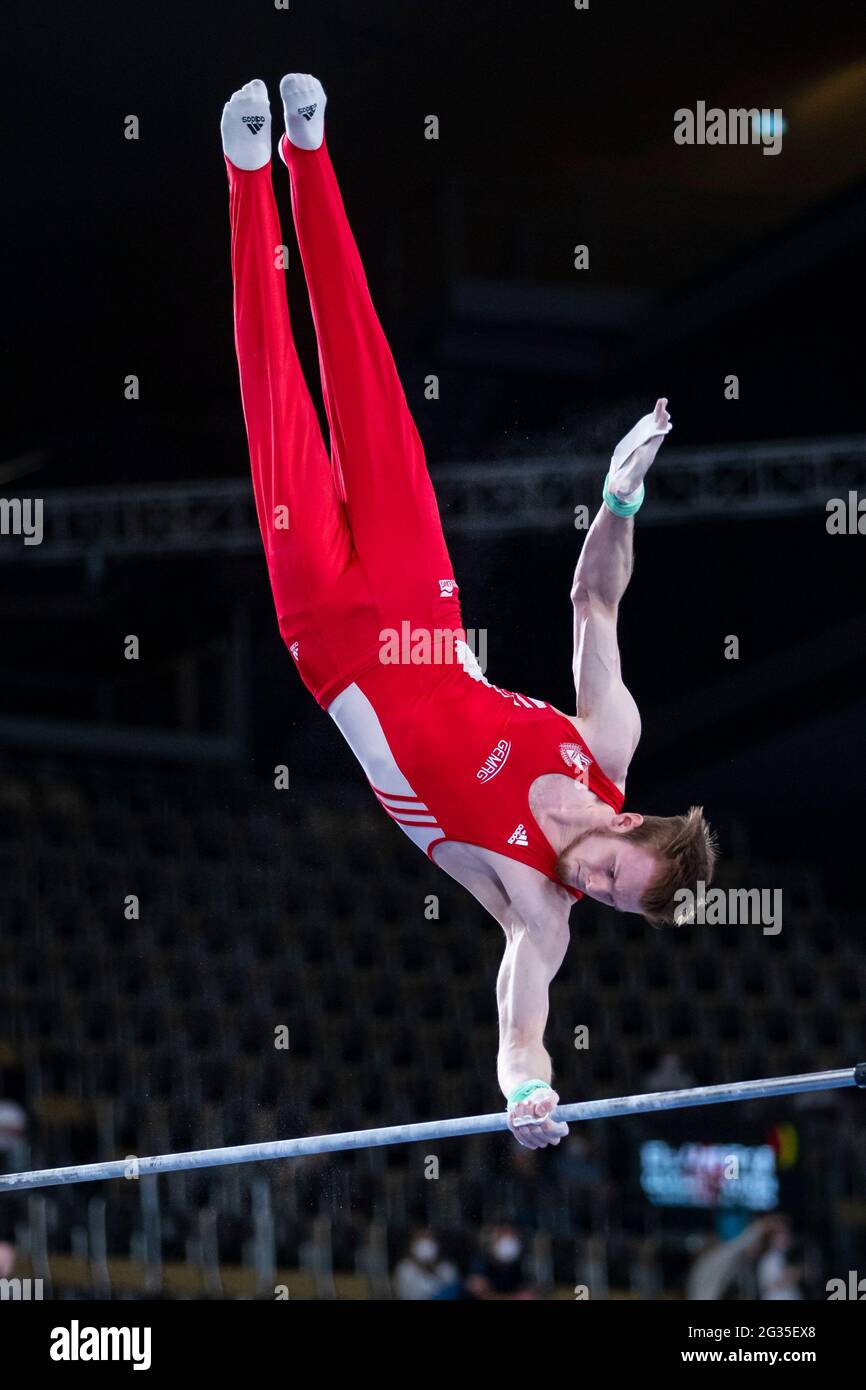 Munich, Germany. 12th June, 2021. Gymnastics: Olympic qualification, men: Leonard Prügel in action on high bar. Credit: Tom Weller/dpa/Alamy Live News Stock Photo
