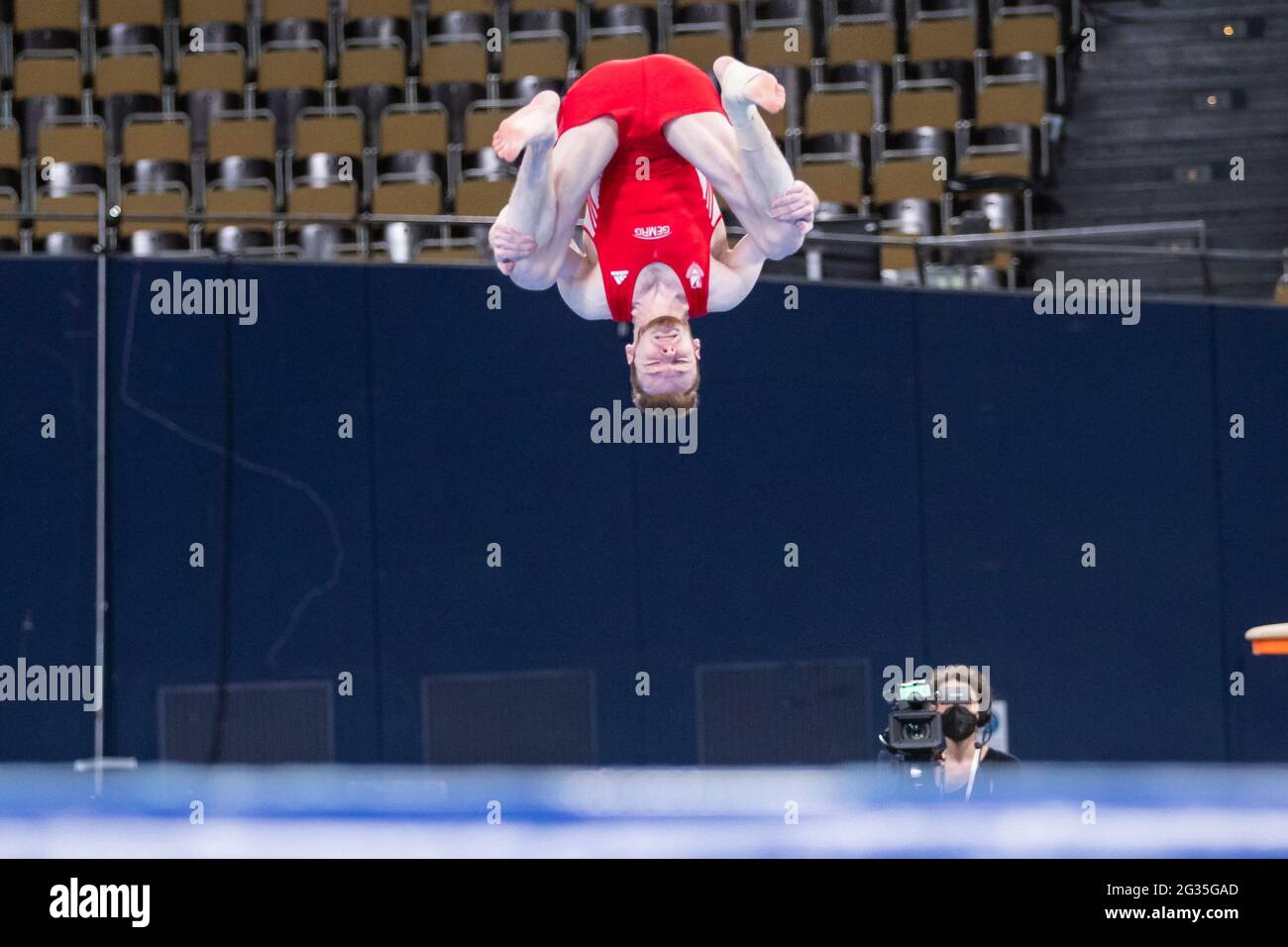 Munich, Germany. 12th June, 2021. Gymnastics: Olympic qualification, men: Leonard Prügel in action on floor. Credit: Tom Weller/dpa/Alamy Live News Stock Photo