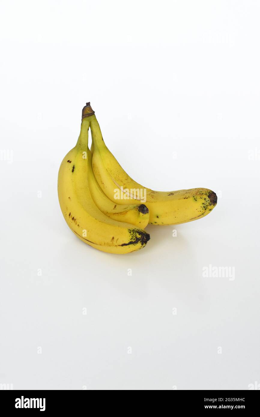 Yellow ripe bananas on isolated white background Stock Photo