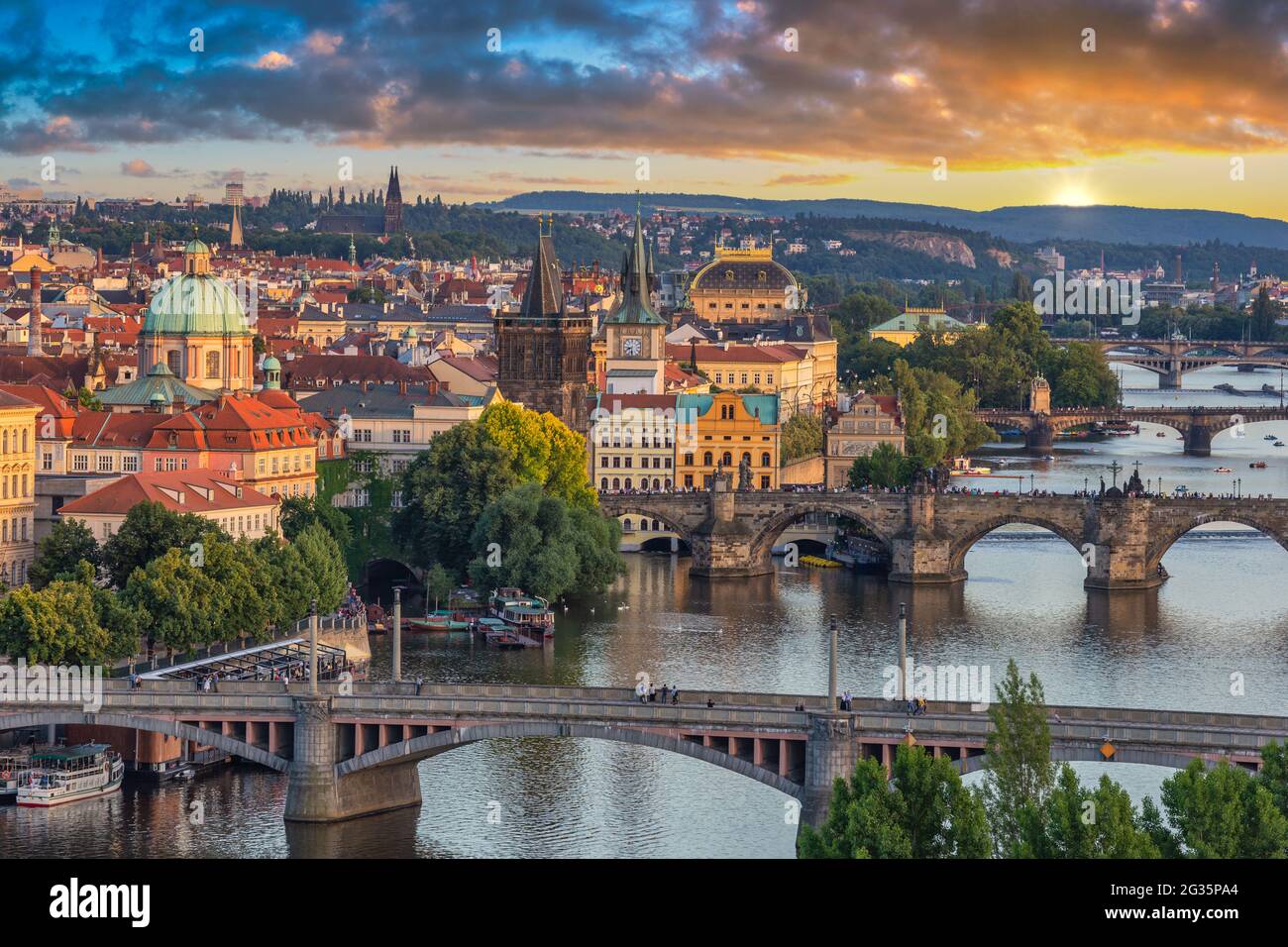 Prague Czech Republic, high angle view sunset city skyline at Charles Bridge and Vltava River, Czechia Stock Photo